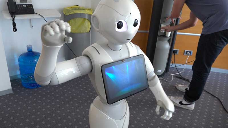 robot le sommet de l'intelligence artificielle du 28 mai 2024